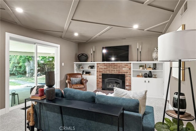 1516 Downing Ave, Chico, CA 95926 - carpeted living room featuring a brick fireplace and recessed lighting