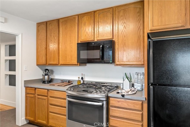 1516 Downing Ave, Chico, CA 95926 - kitchen with black appliances and light countertops