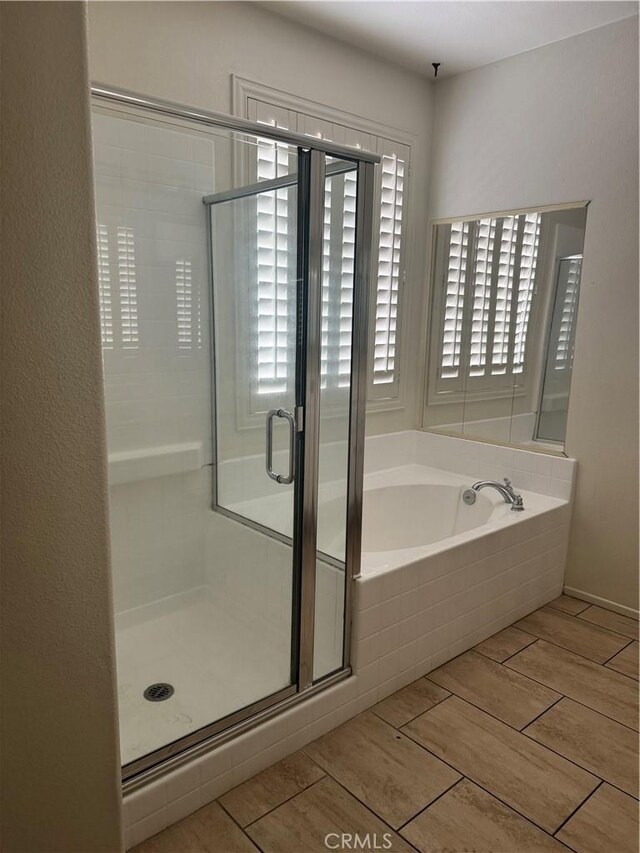 14543 Handsdale St, Adelanto, CA 92301 - bathroom with a bath and a stall shower