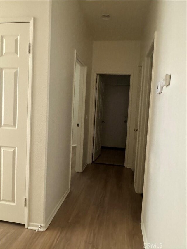 14543 Handsdale St, Adelanto, CA 92301 - hall with wood finished floors and baseboards