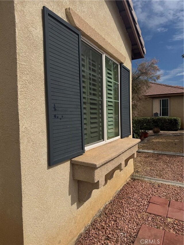 14543 Handsdale St, Adelanto, CA 92301 - exterior view of stucco siding