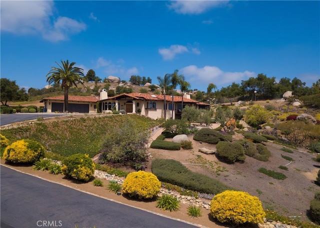 28306 Crescent Hill Way, Escondido, CA 92026 - view of front of property featuring a garage, asphalt driveway, a chimney, and stucco siding