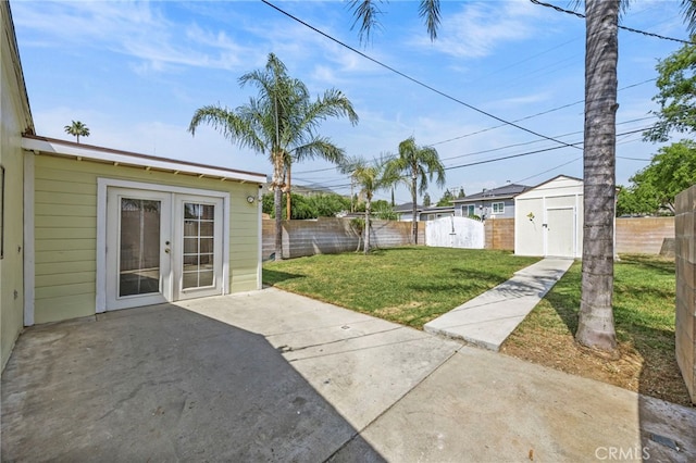 4909 Sepulveda Ave, San Bernardino, CA 92404 - view of yard featuring a patio and french doors
