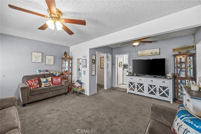 4909 Sepulveda Ave, San Bernardino, CA 92404 - carpeted living area with a ceiling fan and a textured ceiling