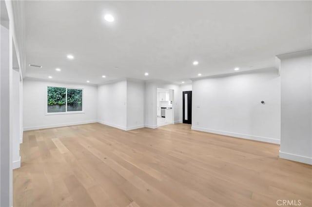 4637 Nagle Ave, Sherman Oaks, CA 91423 - unfurnished living room with light wood finished floors, recessed lighting, and baseboards
