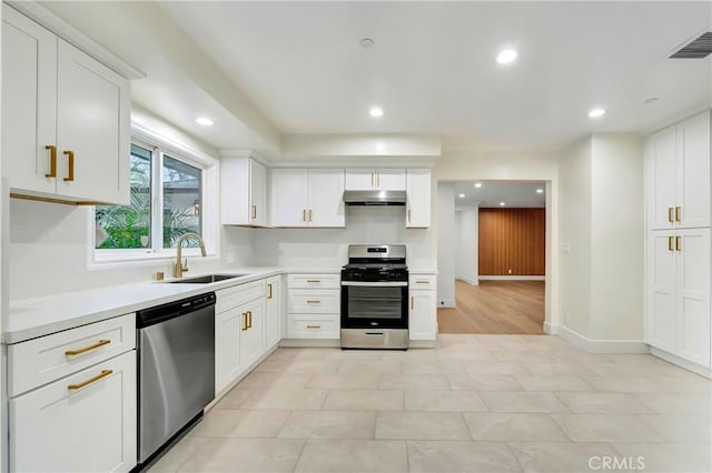 4637 Nagle Ave, Sherman Oaks, CA 91423 - kitchen with appliances with stainless steel finishes, a sink, under cabinet range hood, white cabinetry, and recessed lighting