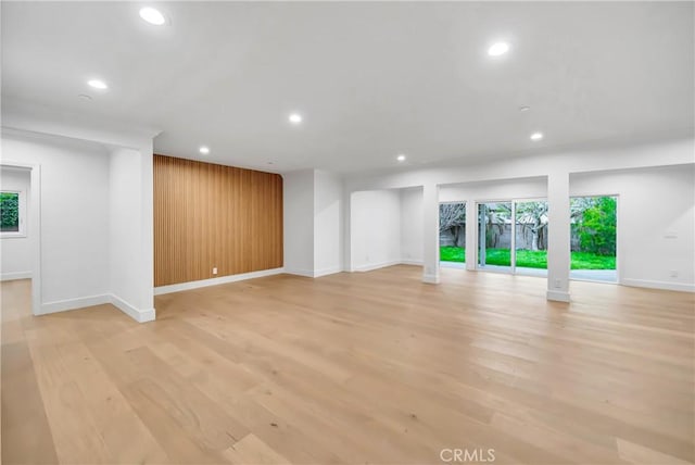 4637 Nagle Ave, Sherman Oaks, CA 91423 - unfurnished living room with baseboards, recessed lighting, and light wood-style flooring