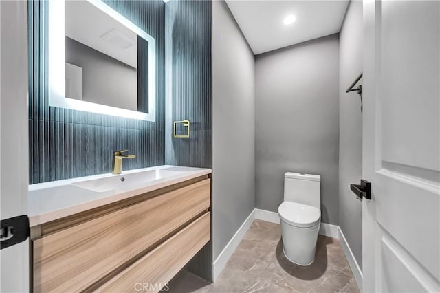 4637 Nagle Ave, Sherman Oaks, CA 91423 - bathroom with toilet, vanity, and baseboards