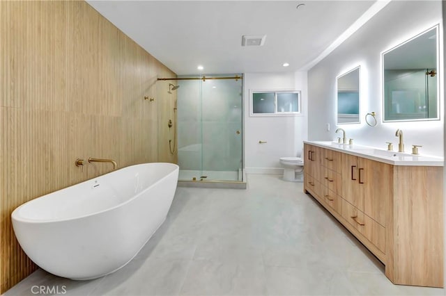 4637 Nagle Ave, Sherman Oaks, CA 91423 - bathroom featuring a shower stall, double vanity, a freestanding bath, and toilet