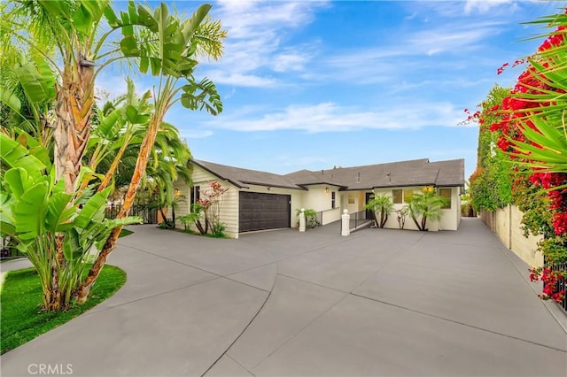 4637 Nagle Ave, Sherman Oaks, CA 91423 - ranch-style home featuring a garage and driveway