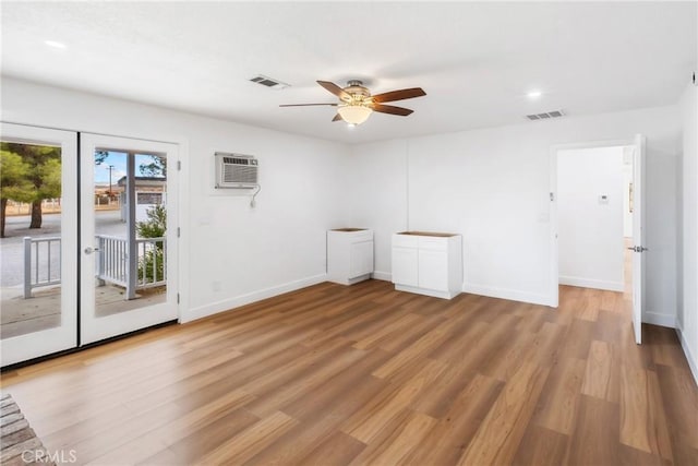 14040 Oden Dr, Apple Valley, CA 92307 - empty room featuring ceiling fan, baseboards, light wood-style floors, recessed lighting, and a wall unit AC