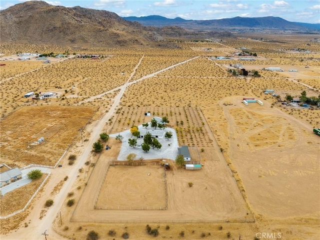 14040 Oden Dr, Apple Valley, CA 92307 - aerial view of property and surrounding area featuring rural landscape, a mountain backdrop, and a desert landscape