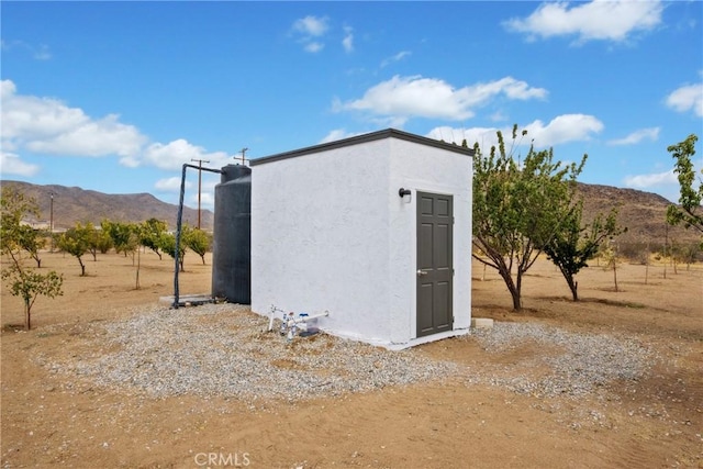 14040 Oden Dr, Apple Valley, CA 92307 - view of outdoor structure featuring a mountain view and a view of rural / pastoral area
