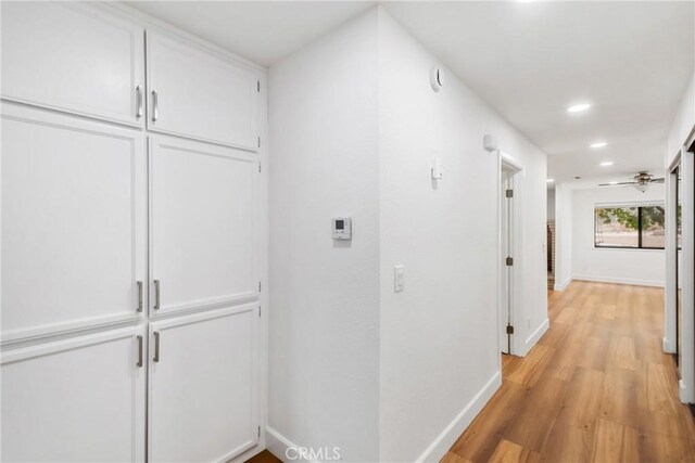 14040 Oden Dr, Apple Valley, CA 92307 - corridor featuring baseboards, light wood-style flooring, and recessed lighting