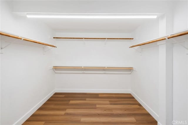 14040 Oden Dr, Apple Valley, CA 92307 - walk in closet with wood finished floors
