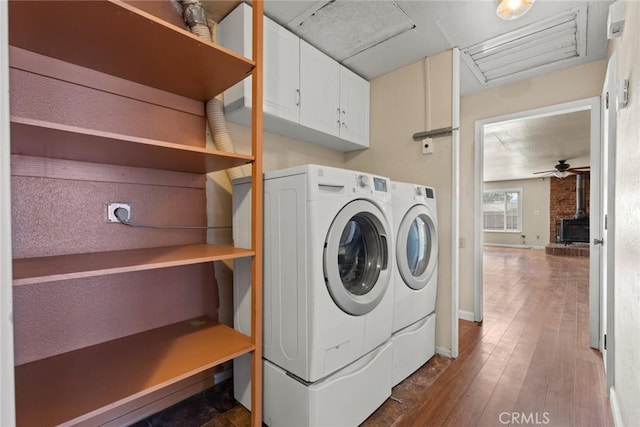 2 Comstock Rd, Chico, CA 95928 - laundry room featuring independent washer and dryer, cabinet space, ceiling fan, attic access, and wood finished floors