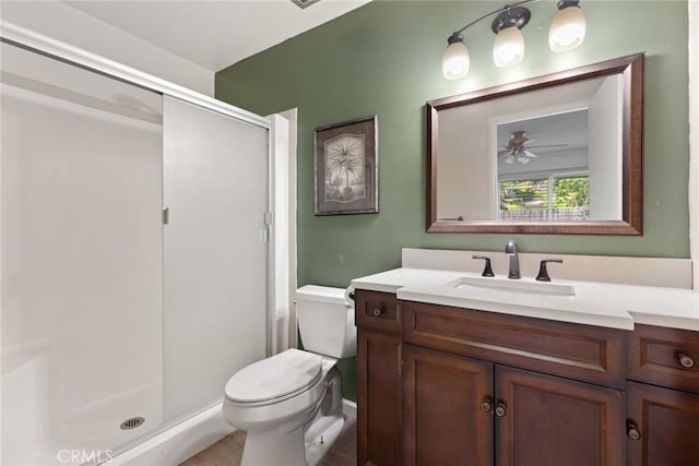 2 Comstock Rd, Chico, CA 95928 - full bathroom with a stall shower, vanity, toilet, baseboards, and ceiling fan