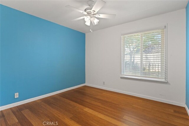 2 Comstock Rd, Chico, CA 95928 - unfurnished room with baseboards, a ceiling fan, and wood finished floors
