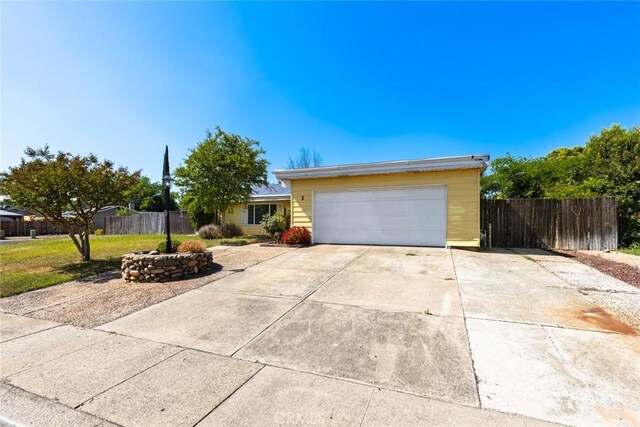 2 Comstock Rd, Chico, CA 95928 - view of front of home with a garage and driveway