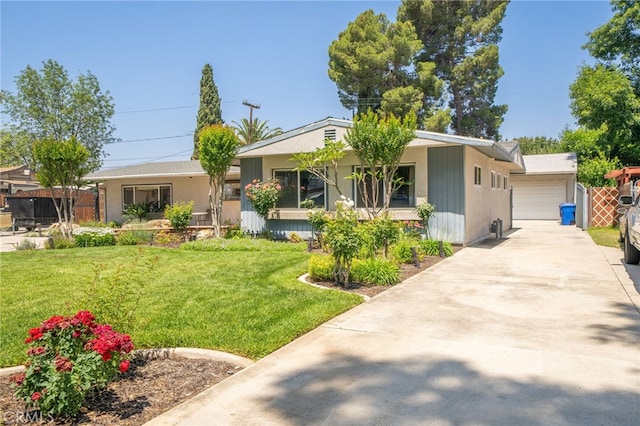 7191 Nixon Dr, Riverside, CA 92504 - view of front of house with a front lawn and a garage