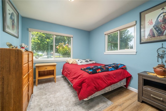7191 Nixon Dr, Riverside, CA 92504 - bedroom with wood finished floors and baseboards