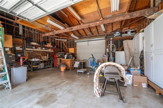 7191 Nixon Dr, Riverside, CA 92504 - garage featuring a workshop area