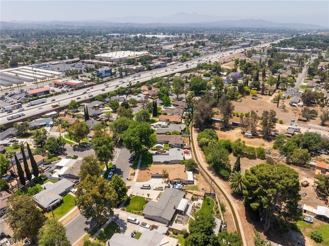 7191 Nixon Dr, Riverside, CA 92504 - aerial view of property's location featuring mountains and nearby suburban area