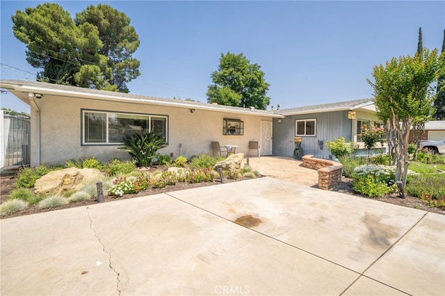 7191 Nixon Dr, Riverside, CA 92504 - ranch-style home with a patio area and stucco siding