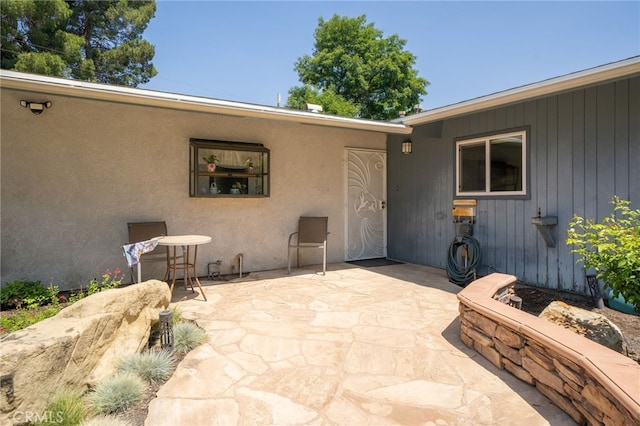 7191 Nixon Dr, Riverside, CA 92504 - doorway to property with a patio area