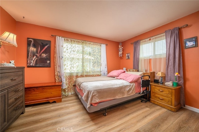 7191 Nixon Dr, Riverside, CA 92504 - bedroom with light wood-type flooring and baseboards