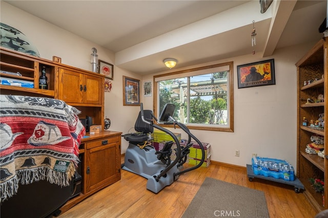 7191 Nixon Dr, Riverside, CA 92504 - workout room with light wood-style floors and baseboards