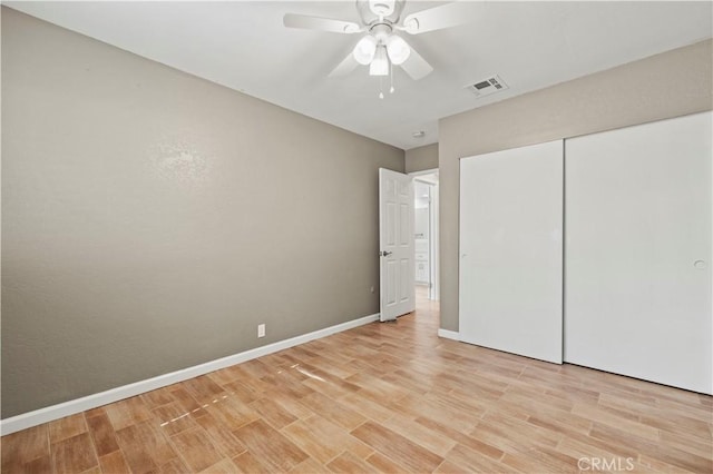 31681 Indian Oak Rd, Acton, CA 93510 - unfurnished bedroom with light wood finished floors, baseboards, a closet, and a ceiling fan