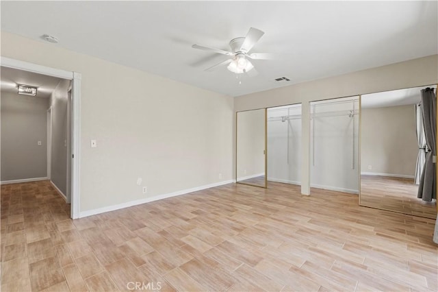 31681 Indian Oak Rd, Acton, CA 93510 - unfurnished bedroom featuring two closets, light wood finished floors, and baseboards