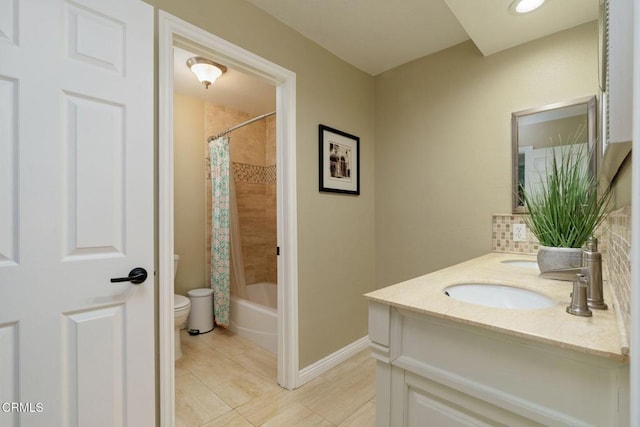 12983 Camden Ct, Moorpark, CA 93021 - full bathroom featuring toilet, vanity, shower / tub combo with curtain, baseboards, and tile patterned flooring