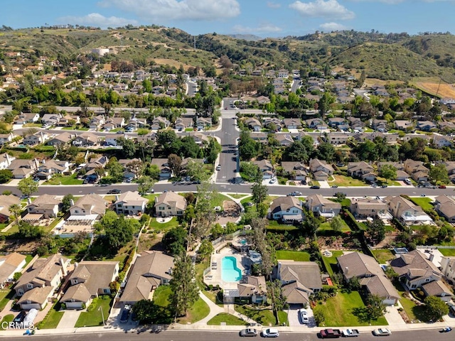 12983 Camden Ct, Moorpark, CA 93021 - aerial view of property and surrounding area with nearby suburban area, a pool, and a mountainous background