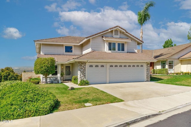 12983 Camden Ct, Moorpark, CA 93021 - traditional home with a tiled roof, an attached garage, stone siding, and concrete driveway