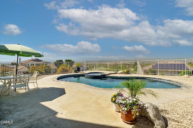 12983 Camden Ct, Moorpark, CA 93021 - view of swimming pool featuring a fenced backyard, a patio, and a pool with connected hot tub