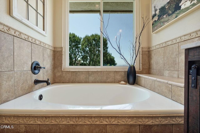 12983 Camden Ct, Moorpark, CA 93021 - bathroom with a garden tub and tile walls