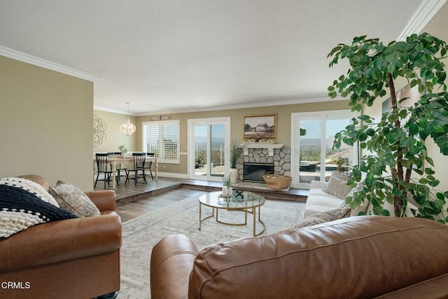 12983 Camden Ct, Moorpark, CA 93021 - living area with crown molding, wood finished floors, a fireplace, and baseboards
