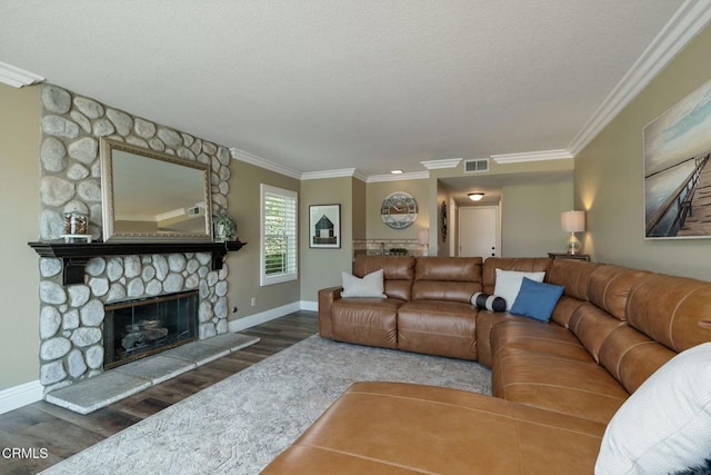 12983 Camden Ct, Moorpark, CA 93021 - living area with wood finished floors, crown molding, baseboards, and a fireplace