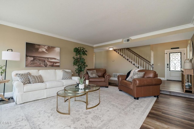 12983 Camden Ct, Moorpark, CA 93021 - living area featuring ornamental molding, stairs, wood finished floors, and baseboards