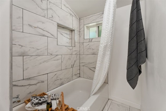 217 N Mcclay St, Santa Ana, CA 92701 - full bath featuring shower / tub combo, marble finish flooring, and baseboards