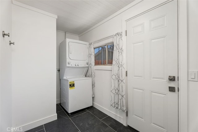 217 N Mcclay St, Santa Ana, CA 92701 - laundry room featuring estacked washer and dryer, baseboards, and ornamental molding