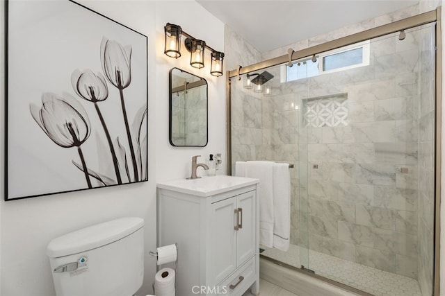 217 N Mcclay St, Santa Ana, CA 92701 - bathroom featuring toilet, vanity, and a stall shower