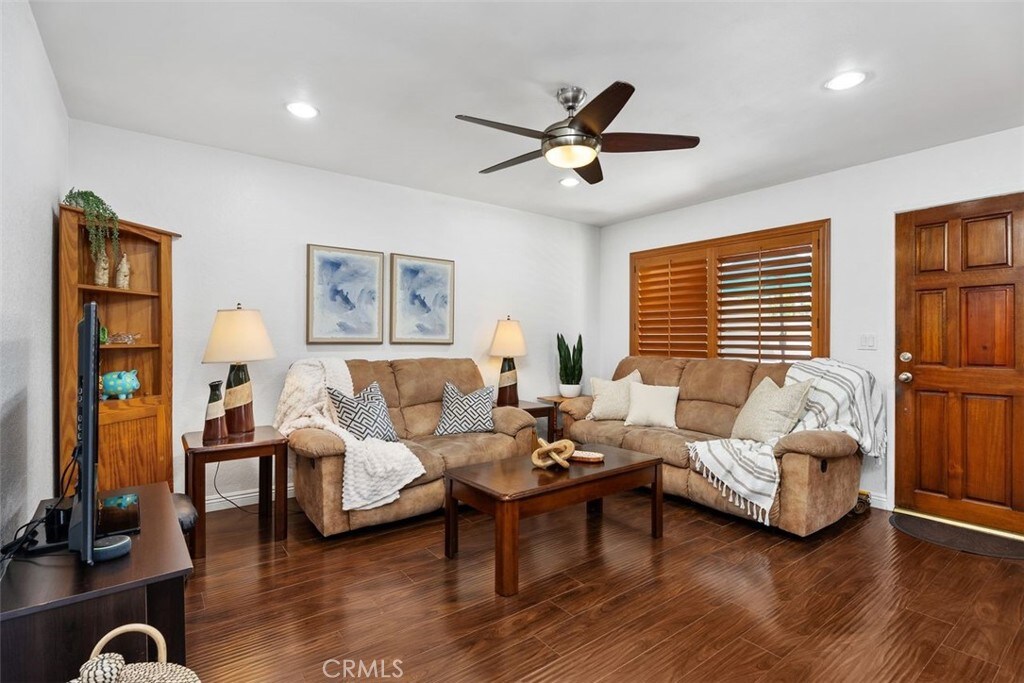 12526 Cuesta Dr, Cerritos, CA 90703 - living room with ceiling fan, dark wood-style floors, and recessed lighting