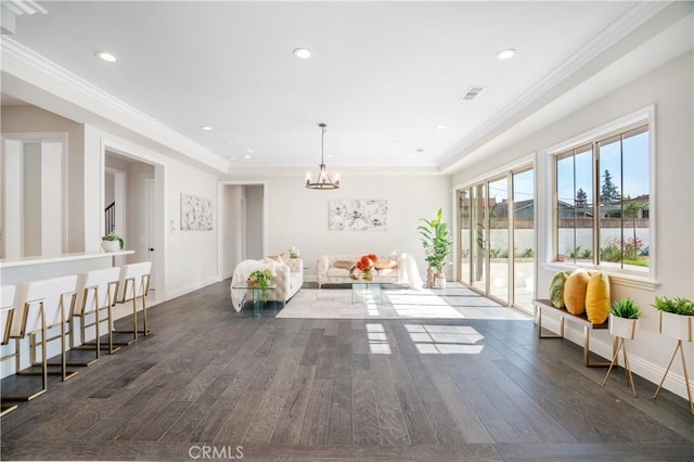 5305 Glickman Ave, Temple City, CA 91780 - living room with dark wood-style floors, baseboards, recessed lighting, ornamental molding, and a chandelier