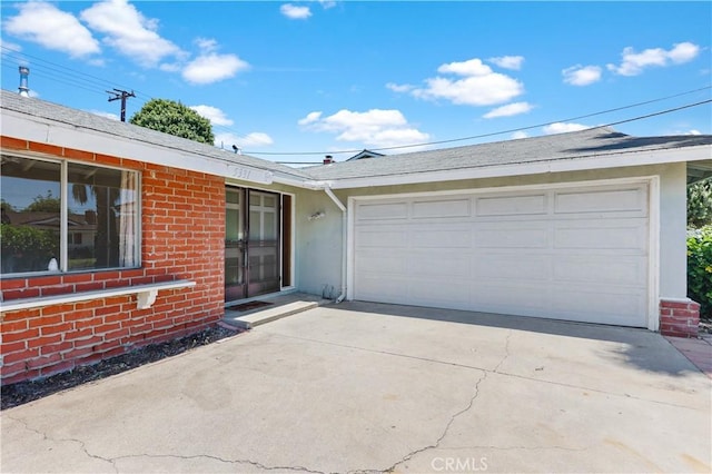 5331 Vallecito Ave, Westminster, CA 92683 - view of front of property with brick siding, driveway, an attached garage, and stucco siding