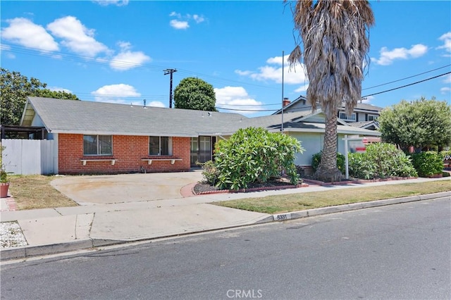 5331 Vallecito Ave, Westminster, CA 92683 - ranch-style house featuring brick siding, driveway, and a shingled roof