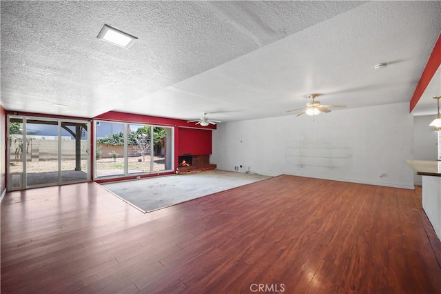 5331 Vallecito Ave, Westminster, CA 92683 - unfurnished living room with ceiling fan, a textured ceiling, and wood finished floors