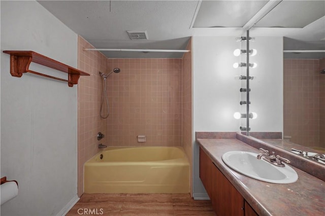 5331 Vallecito Ave, Westminster, CA 92683 - bathroom featuring wood finished floors, shower / bathtub combination, and vanity